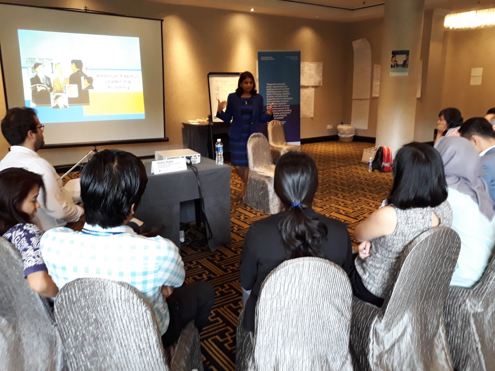 Shaily Gupta conducting a session on women leadership for a Singapore audience.