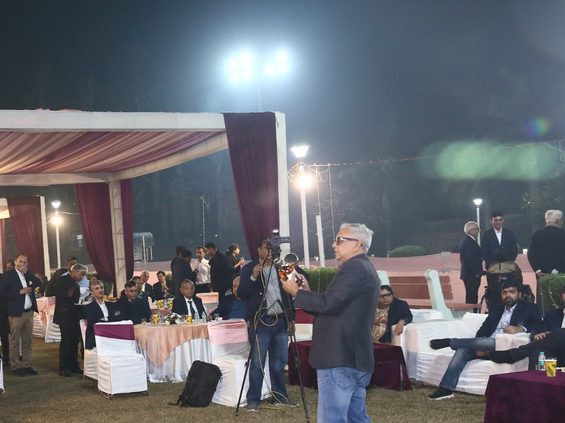 A speaker leading a masterclass on Whiskies of the World outdoors