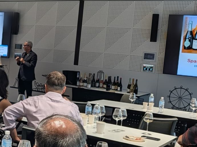 A masterclass on Sparkling Wines of the World in session at a global bank